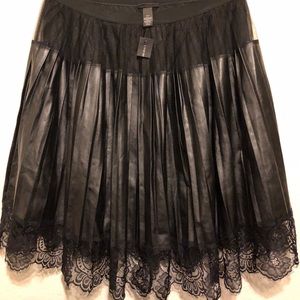 PLEATED FAUX LEATHER SKIRT WITH LACE TRIM